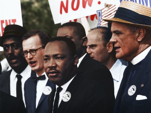 Dr. Martin Luther King, Jr. and Mathew Ahmann in a crowd of demonstrators at the March on Washington
